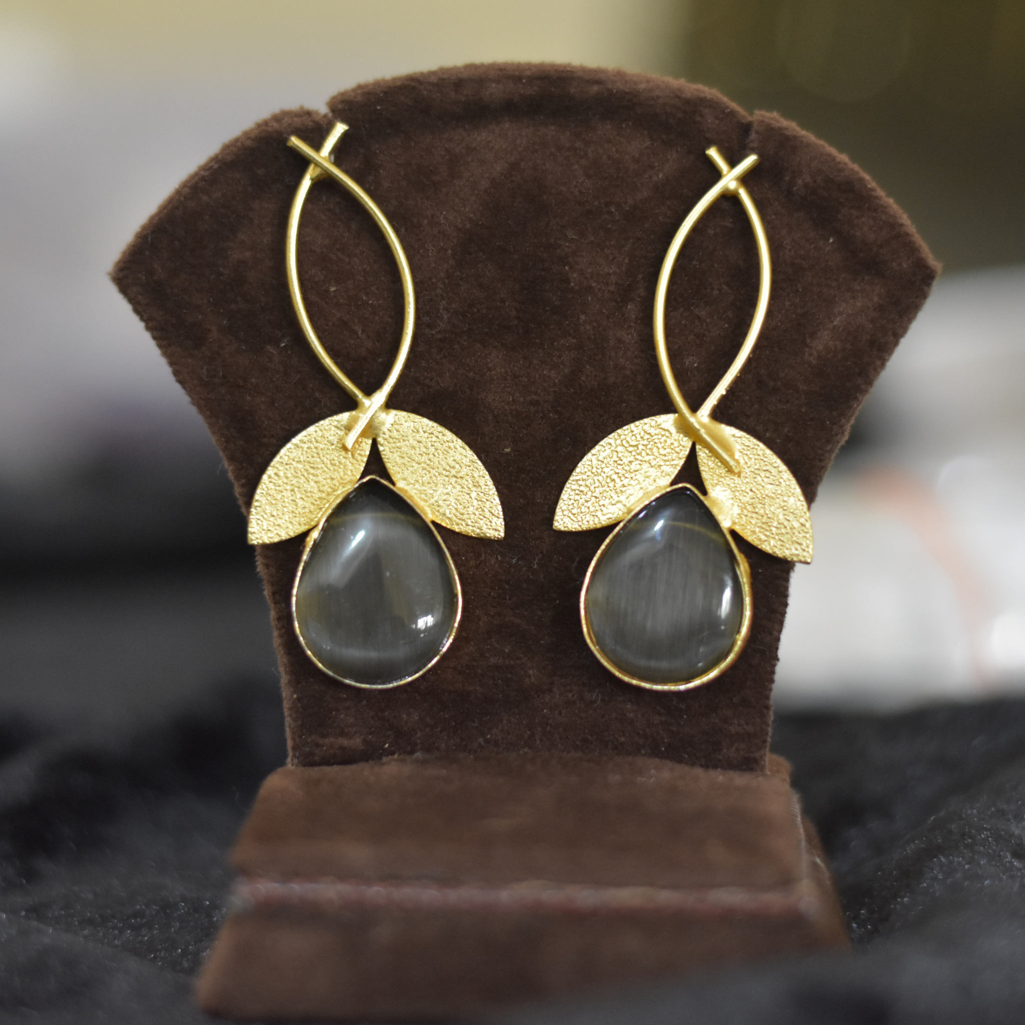 Beautiful Golden leaf earrings with black natural stone