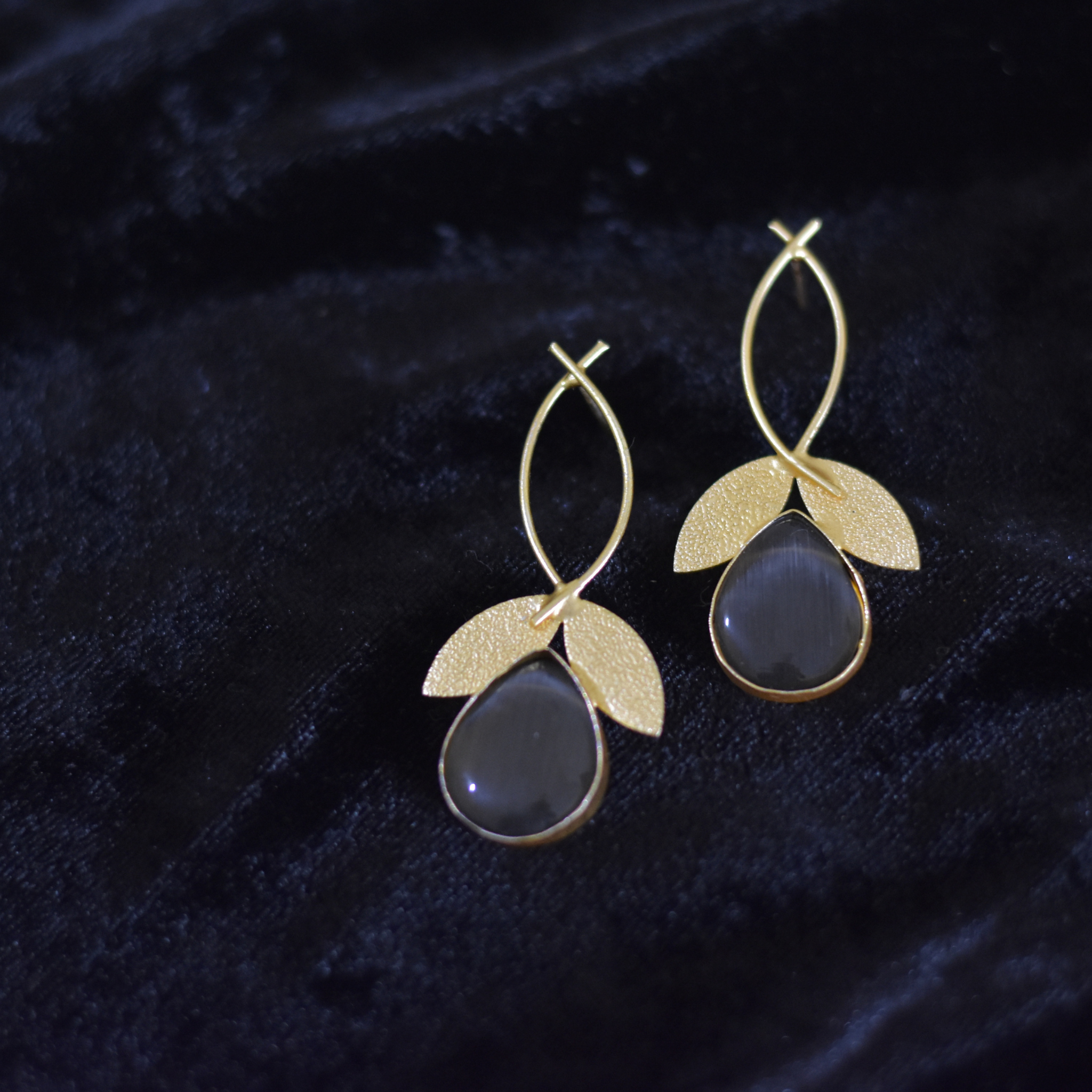 Beautiful Golden leaf earrings with black natural stone